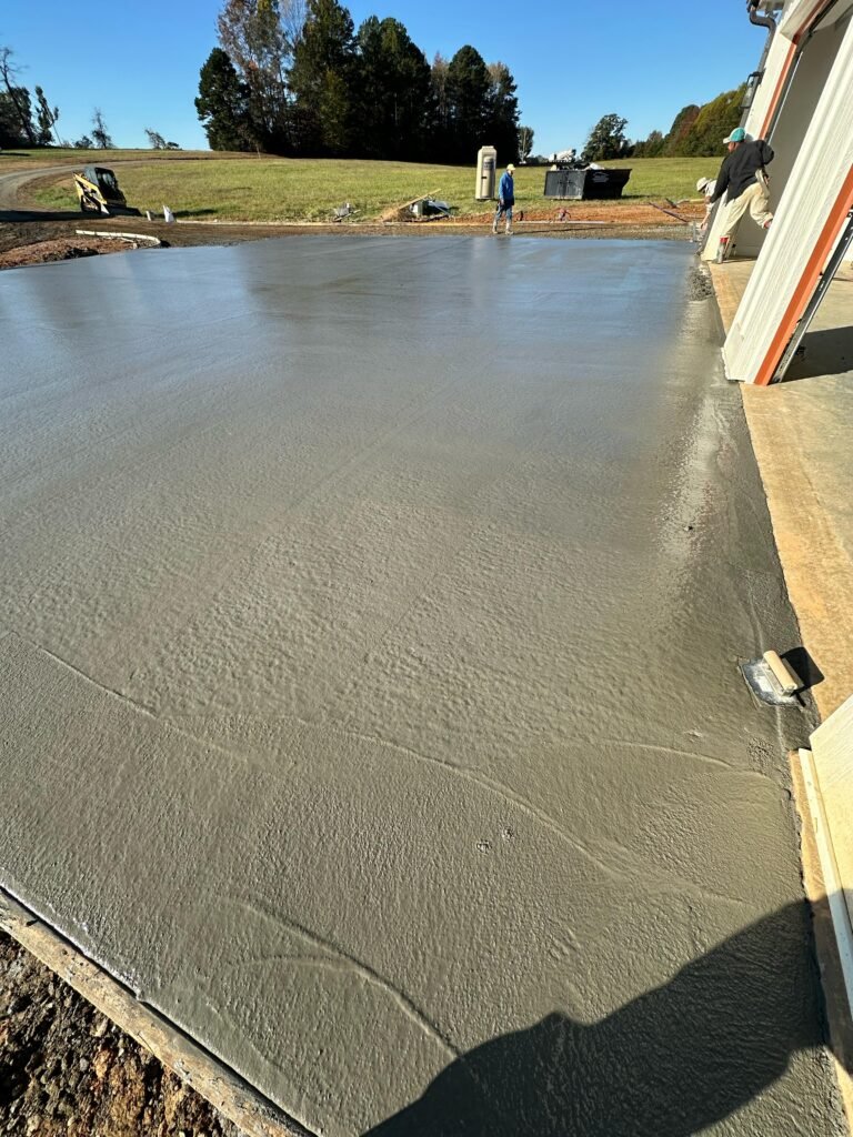 ARG Concrete Pouring and finishing a Concrete Driveway in Charlotte NC