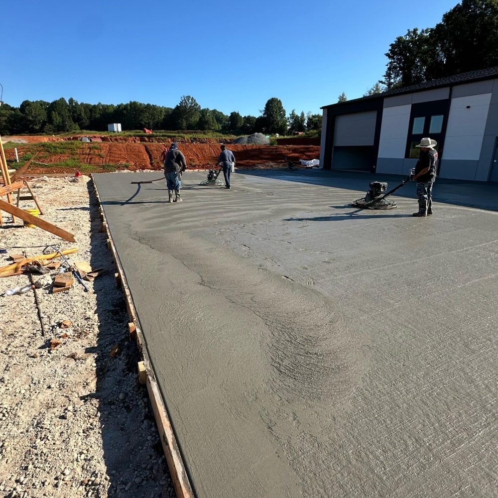ARG Working on a job site leveling a concrete Slab